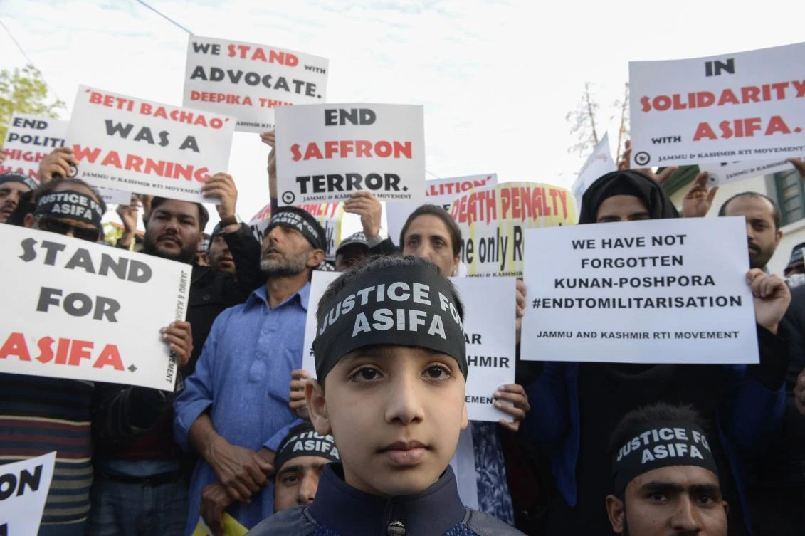Indian demonstrators shout anti-government slogans at a protest in Srinagar on April 14, 2018 over the gang rape and murder of an eight-year-old girl in northern India. (AFP)