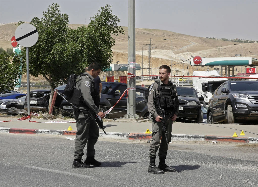 The Israeli military says it has arrested 15 Hamas operatives in an overnight West Bank raid. (AP)