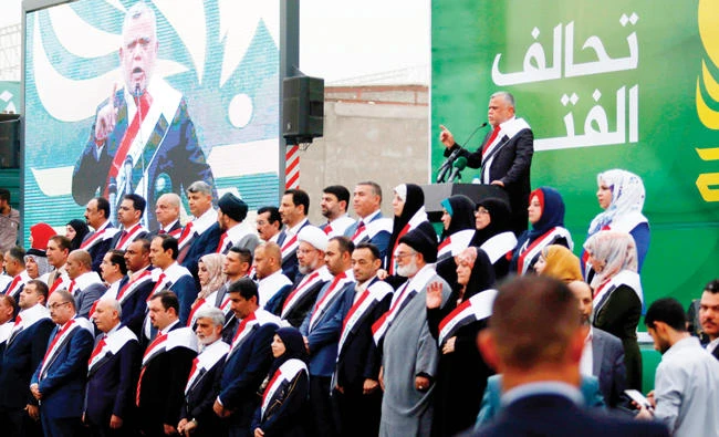 Hadi Al-Ameri, head of the Badr organization and leader of Hashed Al-Shaabi paramilitary units, during a campaign gathering in the city of Basra on April 21, 2018. (AFP)