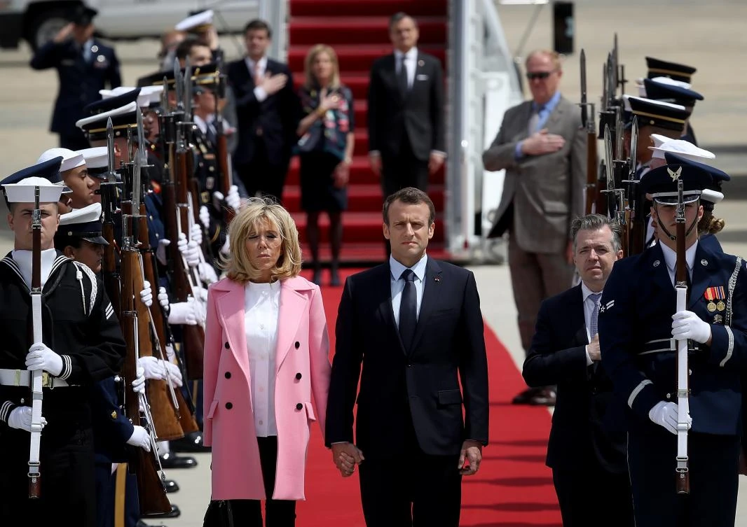French President Emmanuel Macron and his wife Brigitte arrive at Andrews Air Force Base in Maryland. Macron is in Washington for the first state visit hosted by US President Donald Trump. (AFP)