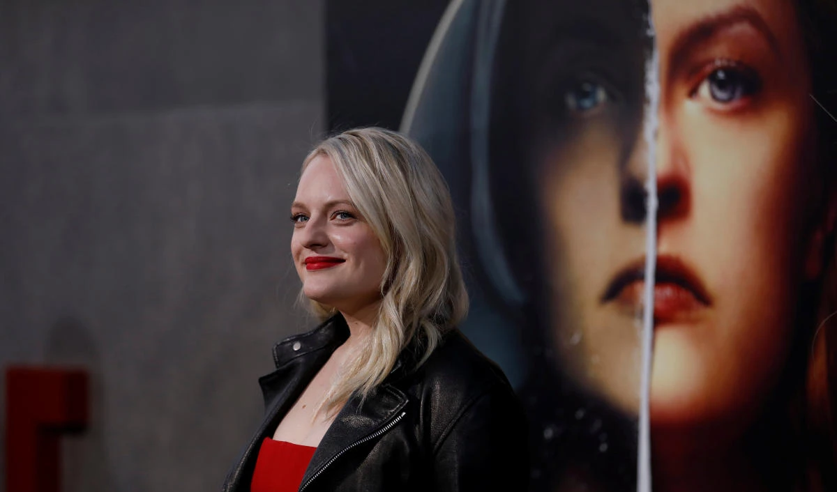 Cast member Elisabeth Moss, who stars as Offred in the hit television series, poses at the premiere for the second season of the television series “The Handmaid’s Tale” in Los Angees on April19. (Reuters)