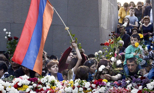 Armenia unites to mark Ottoman massacres after leader quits