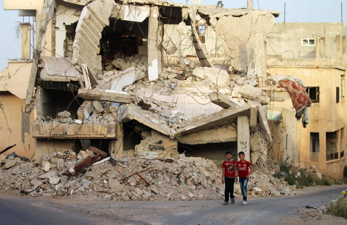 In early March 2011 more than a dozen Daraa youths, influenced by the revolutions in Tunisia and Egypt, scribbled slogans hostile to President Bashar Assad on the wall of their school. (AFP)