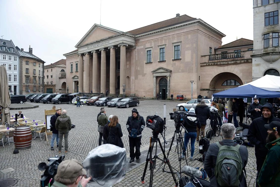 Members of the media set up in front of a courthouse in Copenhagen on Wednesday, April 25. Danish inventor Peter Madsen was found guilty of the premeditated murder and sexual assault of Swedish journalist Kim Wall and was handed a life sentence. (AFP)