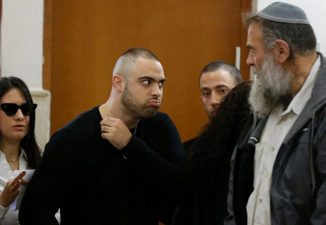 Ben Deri, a 24-year-old Israeli policeman accused of killing a Palestinian teenager in 2014 during clashes in Beitunia in the occupied West Bank, is seen at the district court in Jerusalem on April 25, 2018. (AFP)