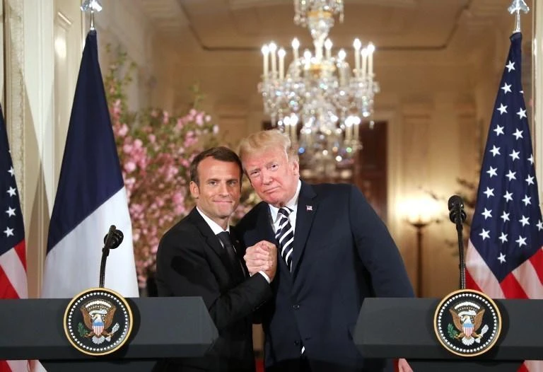 The “bromance” between US President Donald Trump and French leader Emmanuel Macron has provided plenty of material for America’s late night TV comedians. (AFP)