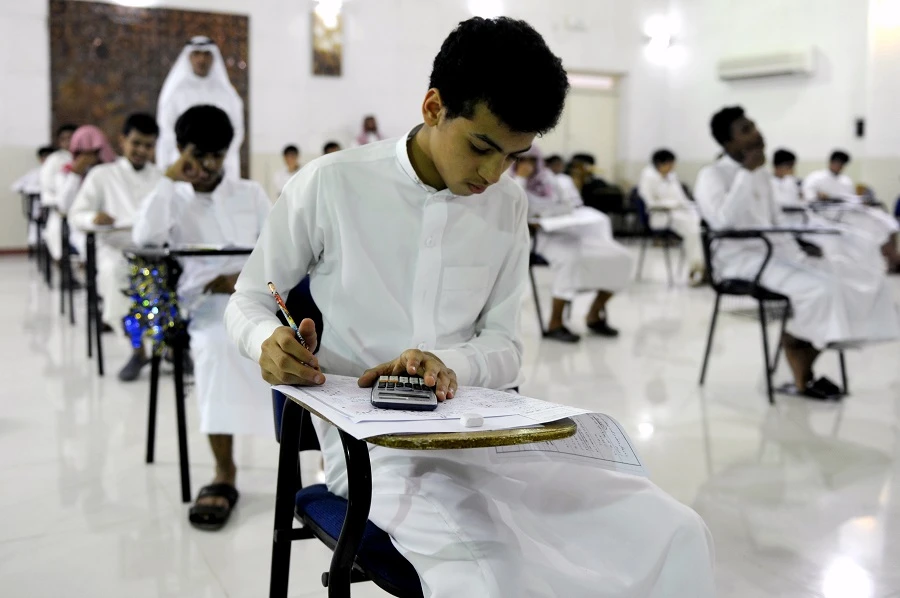 Saudi students sit for their final high school exams in the Red Sea port city of Jeddah. (AFP/Amer Salem)