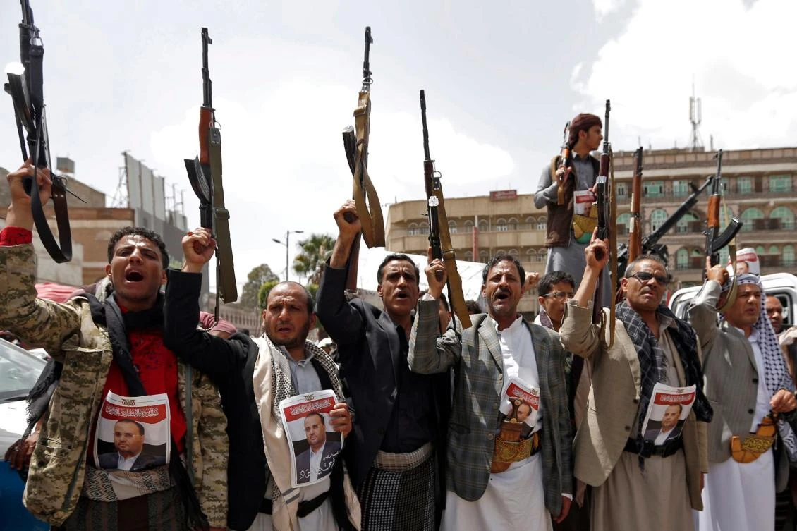 File photo showing Houthi militia fighters attending a rally in Sanaa, Yemen, April 26, 2018. (AFP)