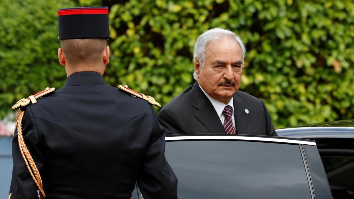 File photo showing Khalifa Haftar, commander of the Libyan National Army, arrives for talks over a political deal to end Libya’s crisis in La Celle-Saint-Cloud, near Paris, July 25, 2017. (Reuters)
