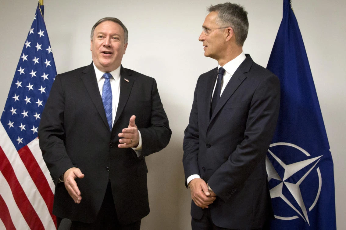 US Secretary of State Mike Pompeo, left, and NATO Secretary General Jens Stoltenberg speak with the media prior to a meeting at NATO headquarters in Brussels on Friday, April 27. A senior US official says Pompeo’s aim is to ensure that NATO maintains a unified position of “no business as usual” with Russia. (AP)