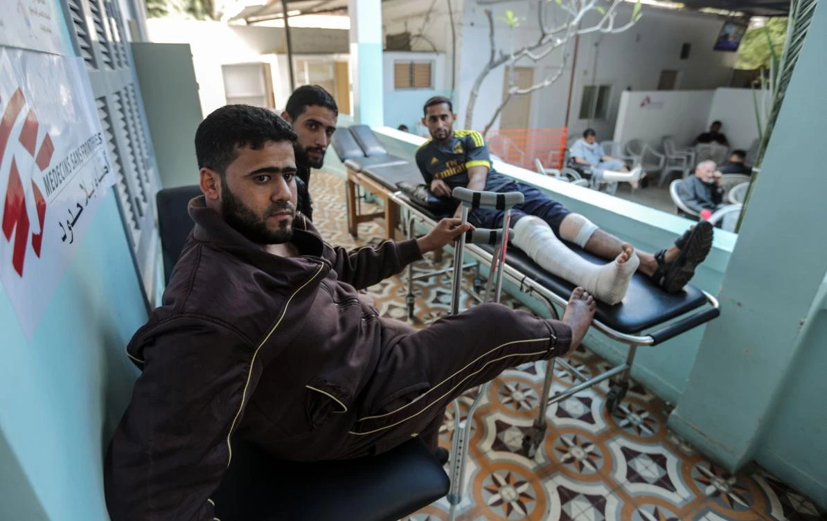 Palestinians, wounded in previous weeks during mass protests against Israeli forces along the border of the Palestinian enclave, dubbed “The Great March of Return,” await medical check-up at the Doctors Without Borders (MSF) clinic in Gaza City on April 25, 2018. (AFP)