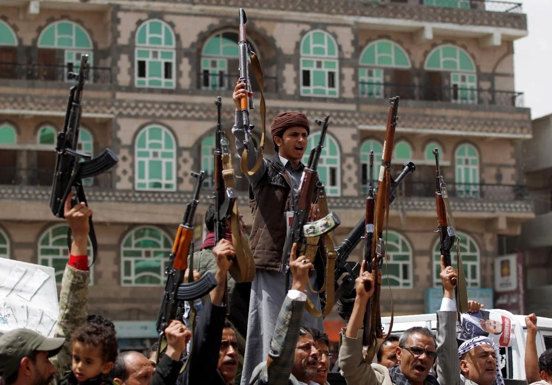 Supporters of Yemen's Houthi militia attend a rally in Sanaa on April 26, 2018 against the killing of their political chief Saleh al-Sammad. (AFP)