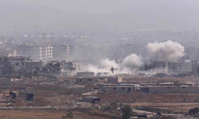 Smoke rises from the Yarmouk Palestinian camp in Damascus amid non-stop bombardment by Syrian regime forces on April 28, 2018. Syria’s opposition has accused Russia and the regime of mockery of the peace process that they are pushing while continuing to unleash excessive violence on civilians. (REUTERS/Omar Sanadiki