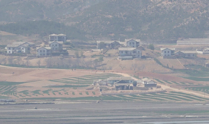 North Korea's Kaepoong town is seen from the unification observatory in Paju, South Korea, on April 28, 2018. (AP Photo/Lee Jin-man)