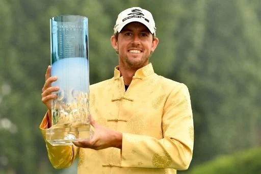 lexander Björk posing with the winner’s trophy of the China Open. (AFP)