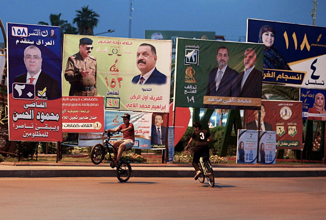 Campaign posters for parliamentary elections adorn a street in Baghdad, Iraq, Thursday, April 19, 2018. (AP)