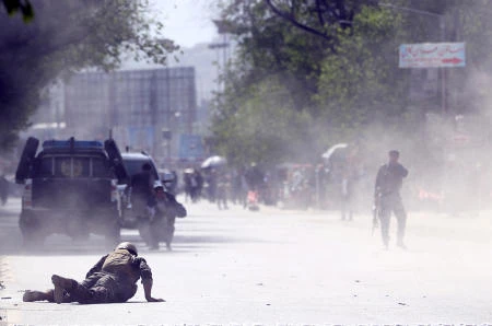 Twin blasts in Afghan capital kill at least 26, including at least nine journalists