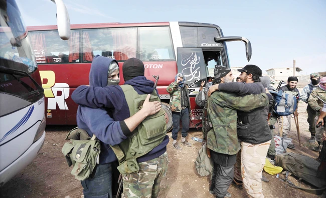 Syrians held by rebels freed as part  of deal with government