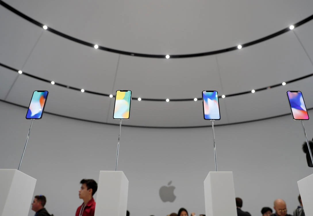 Apple surprises with solid iPhone sales, announces $100 billion buyback
