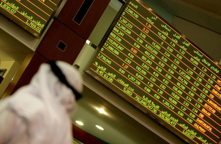 An Emirati man follows the market activity at the Dubai stock market on March 25, 2010. (AFP)