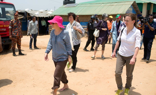 Members of the UN Security Council team walk at the Kutupalong Rohingya refugee camp in Kutupalong, Bangladesh on April 29, 2018. (AP)