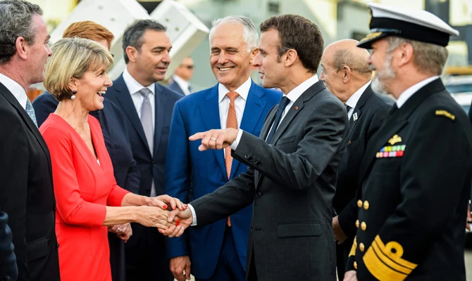 Global giggles as Macron praises Aussie leader’s ‘delicious’ wife
