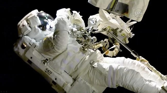 NASA astronaut Joseph Acaba, above, completed one spacewalk on the mission, to lubricate an end effector and install new cameras on the station’s arm and truss. (NASA)