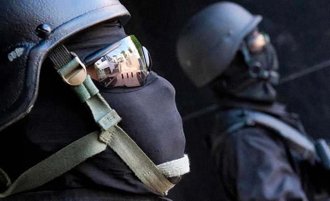 Members of Morocco's anti-terrorism security service stand guard outside the headquarters of the Central Bureau of Judicial Investigation (BCIJ) in Sale near the capital Rabat on May 2, 2018. (AFP)