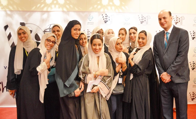 The chairman of Effat University's Visual and Digital Production Department, Dr. Mohammed Ghazala, with a group of students. (Photo/Supplied)