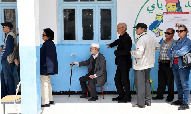 Tunisia’s Ennahda claims victory in landmark local poll