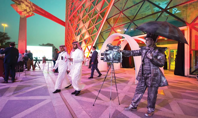 As both regional and international film distributors are interested in entering the Saudi market, the commission is urged to set the guidelines when selecting movie premieres. (Reuters)