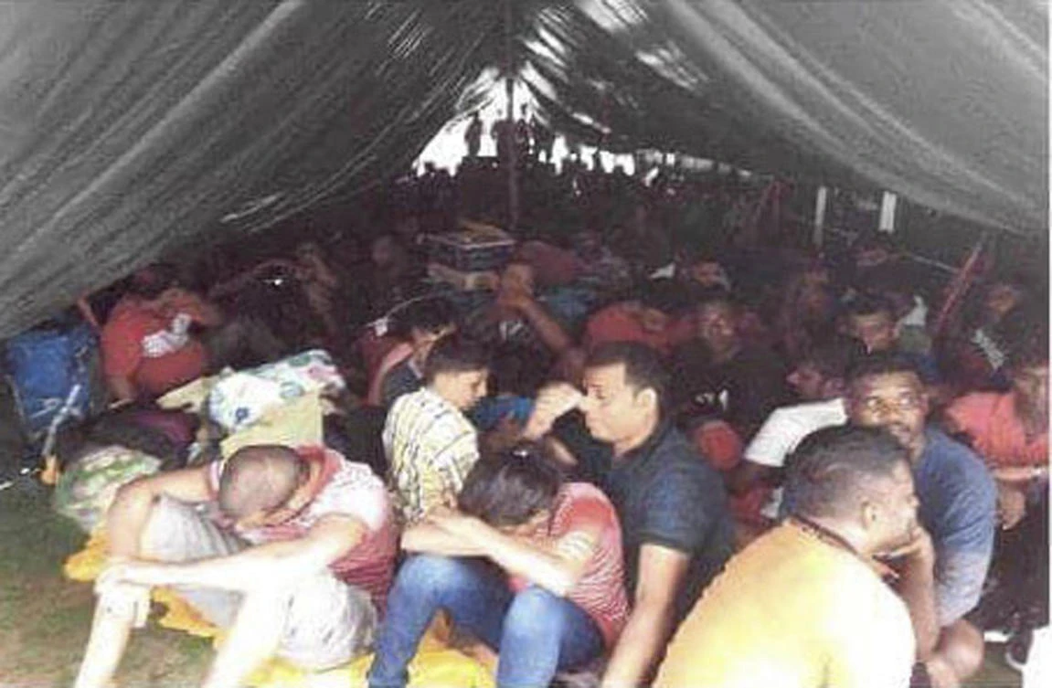 A photo from the Royal Malaysian Police shows Sri Lankan asylum seekers aboard the tanker, believed bound for Australia and New Zealand, that was intercepted off the coast of southern Johor state. (Royal Malaysia Police via AP)