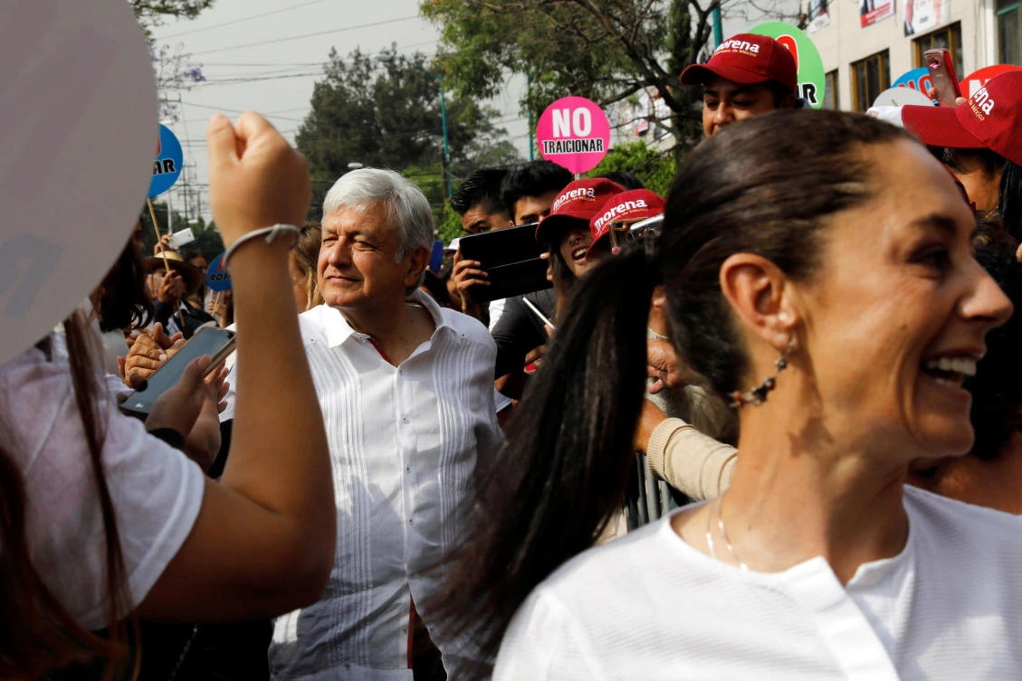 Mexico’s front-running presidential candidate Andres Manuel Lopez Obrador, left, was referenced by prominent journalist Ricardo Aleman in a Twitter message seen as inciting violence. (Reuters)