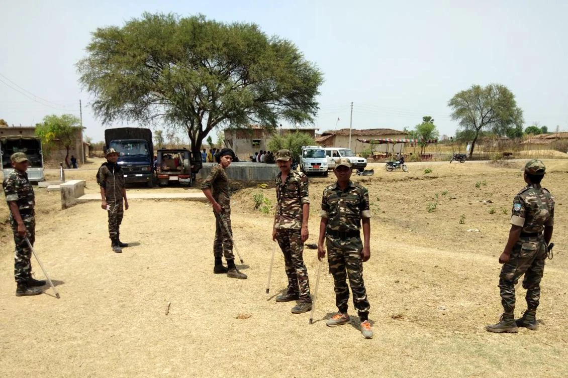 Security personnel stand guard at the location following the rape and murder of a 16-year-old girl on May 3, at Raja Kundra Village in Chatra district of the eastern Indian state of Jharkhand where a 16-year-old girl was raped and murdered. (AFP)