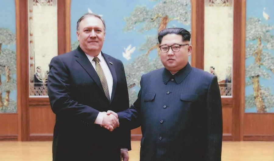 In this photo released by the US Government on April 26, 2018, North Korean leader Kim Jong-Un (R) shakes hands with the former CIA Director, now US Secretary of State, Mike Pompeo in Pyongyang over the 2018 Easter weekend. (US Government via AFP)