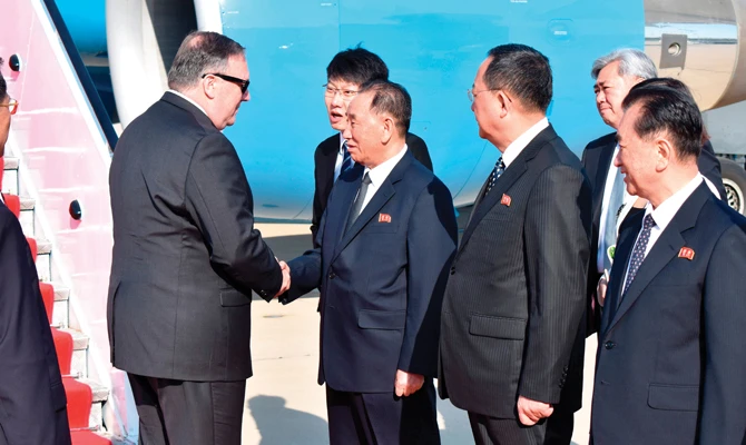 US Secretary of State Mike Pompeo, left, with senior North Korean official Kim Yong Chul and Foreign Minister Ri Su Yong. (AFP)