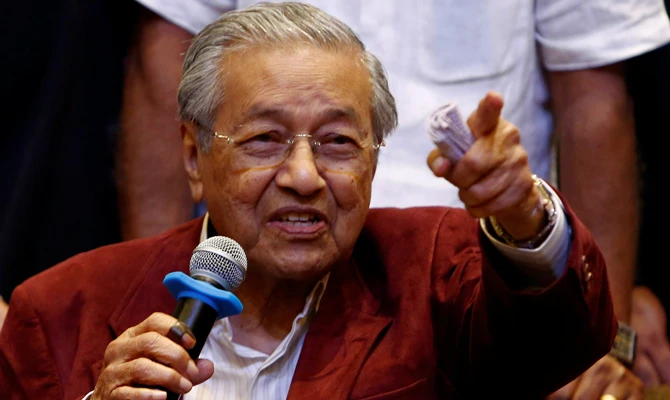 Mahathir Mohamad, former Malaysian prime minister and opposition candidate for Pakatan Harapan (Alliance of Hope), reacts during a news conference after general election, in Petaling Jaya, Malaysia, on May 10, 2018. (REUTERS/Lai Seng Sin)