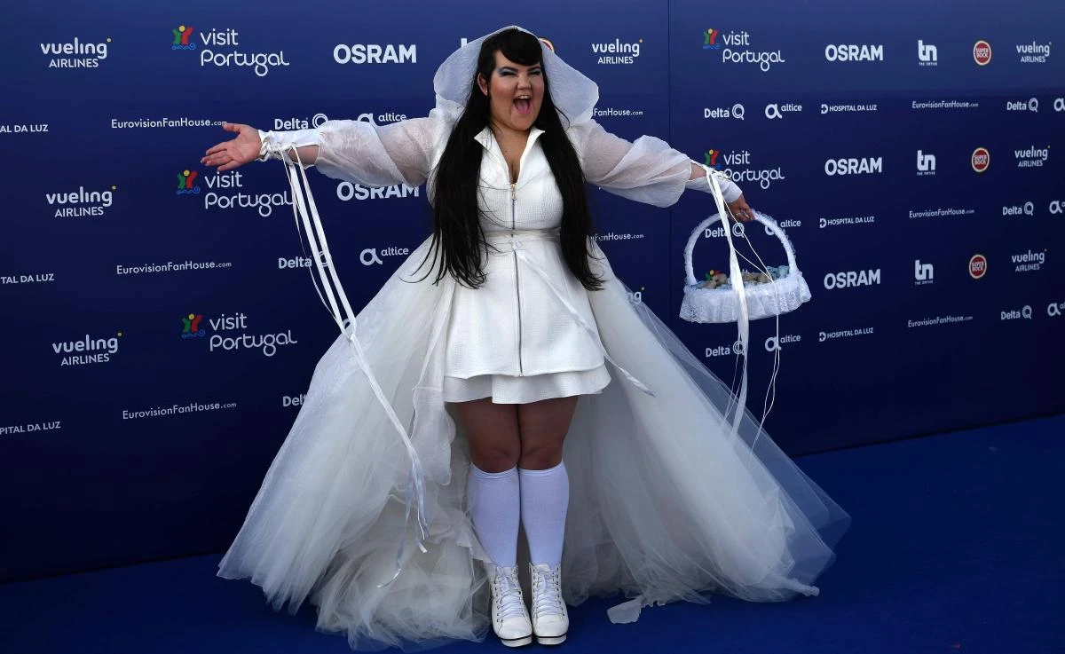 Israeli singer Netta Barzilai aka Netta poses for pictures during the Red Carpet ceremony of the 63rd edition of the Eurovision Song Contest 2018 at the Altice Arena in Lisbon, on May 6, 2018. (AFP/Francisco Leong)