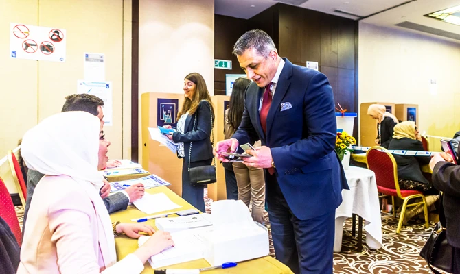 Iraqi expatriates cheerfully participated in the elections in London under the watchful gaze of election observers. (AN photo by James Hanna)