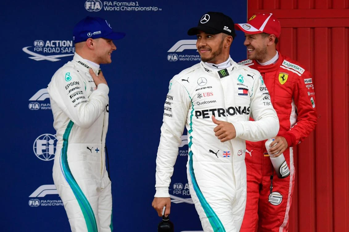 Mercedes' British driver Lewis Hamilton gives the thumbs up after qualifying at the Spanish Grand Prix. (AFP)