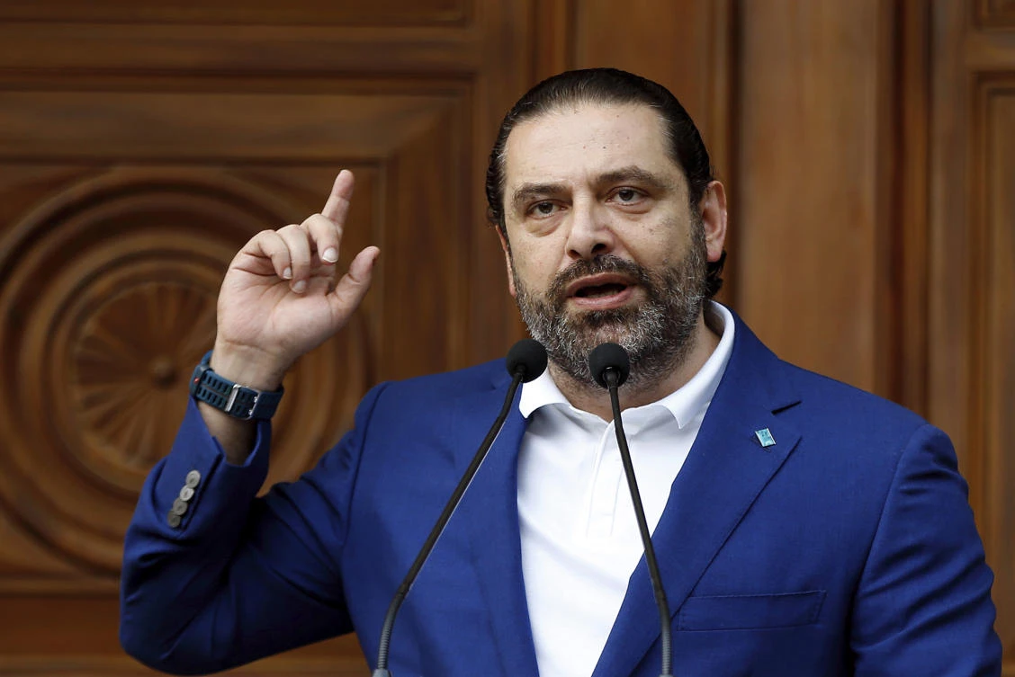 Lebanese Prime Minister Saad Hariri speaks to his supporters during a celebration after his bloc won 21 seats in the parliamentary elections. (AP)