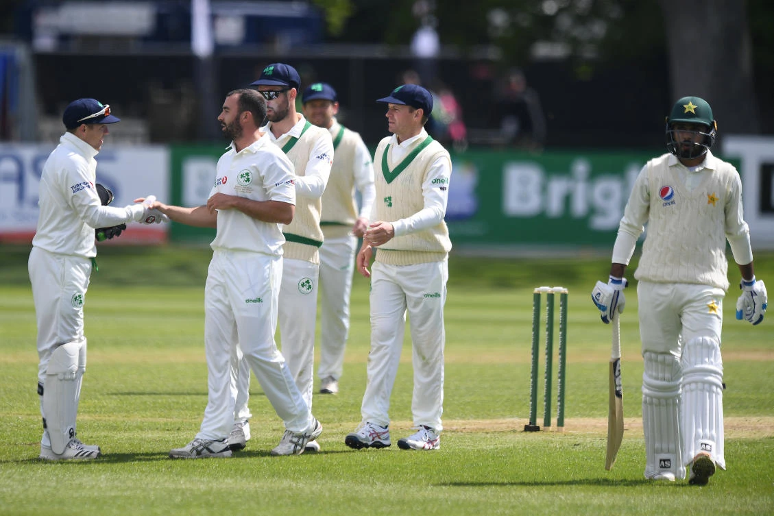 Ireland's Niall O'Brien (L) and Stuart Thompson celebrate after dismissing Pakistan's Faheem Ashraf (R). (REUTERS)