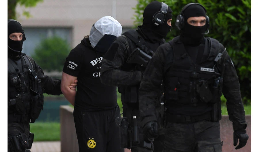 French police question parents, friend of Paris attacker