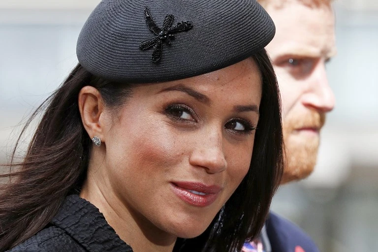 In this file photo taken on April 25, 2018 Britain's Prince Harry (R) and his US fiancee Meghan Markle arrive to attend a service of commemoration and thanksgiving to mark Anzac Day in Westminster Abbey in London on April 25, 2018. (AFP)