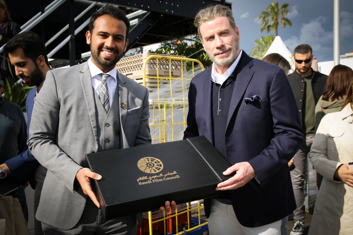 John Travolta visits Saudi pavilion at Cannes