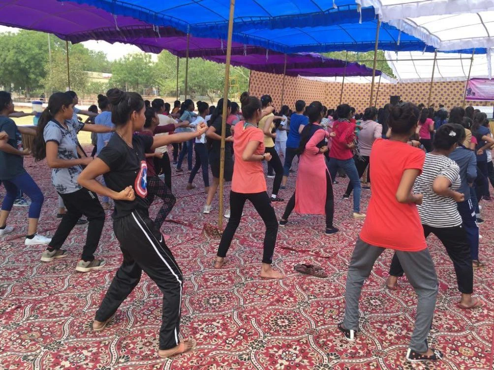 Delhi police teaching girls self-defense tactics during a two-week camp. (AN Photos / Megha Bahree)