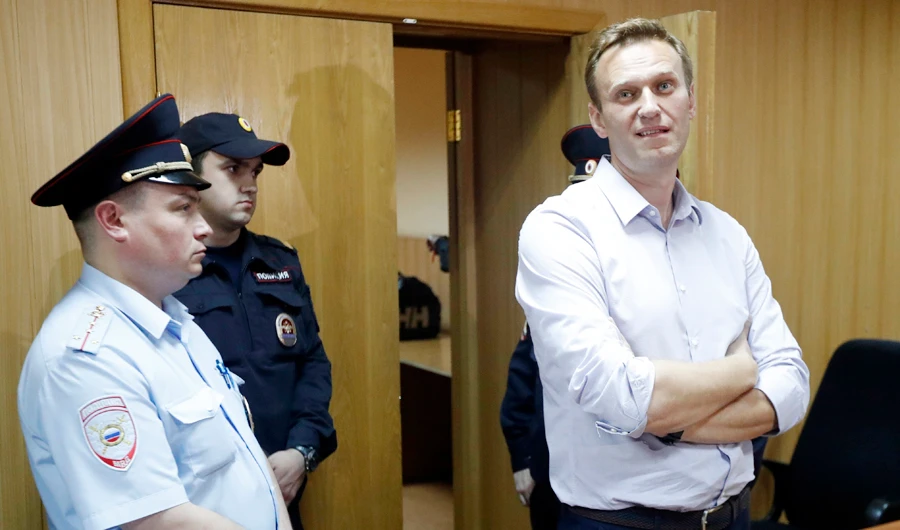 Russian protest leader Alexei Navalny, right, who organized a series of protests on May 5 2018 in the Russian capital, stands in the court in Moscow, Russia, on May 15, 2018. (AP)