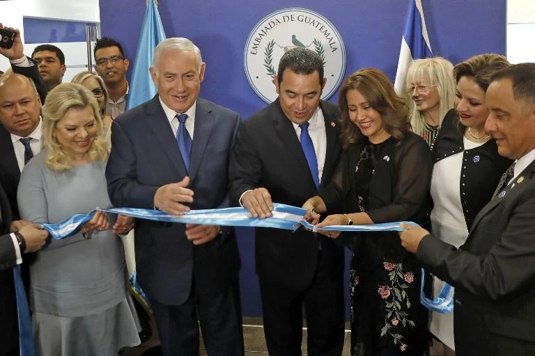 From left: Sara and her husband Israeli Prime Minister Benjamin and Guatemalan President Jimmy Morales and his wife Hilda Patricia Marroquin cut the ribbon during the inauguration ceremony of the Guatemalan embassy in Jerusalem on Wednesday, May 16. (AFP)