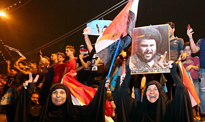 ‘If he says die, we die’: Al-Sadr loyalists jubilant at Iraq poll triumph
