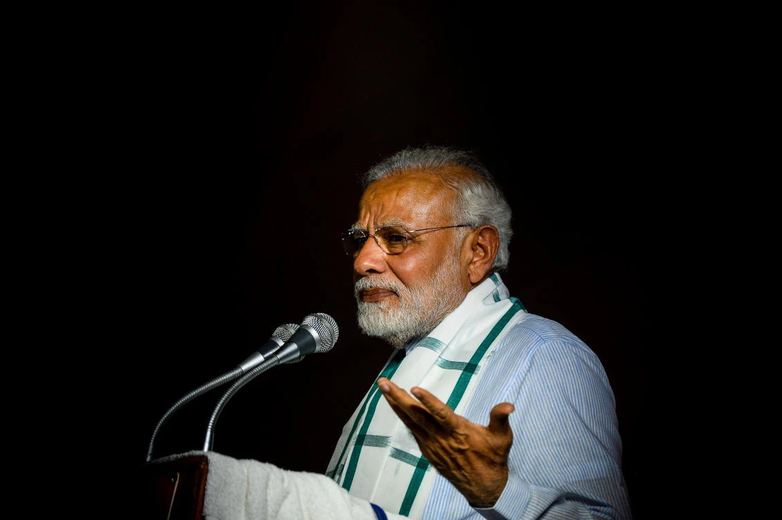 Indian Prime Minister Narendra Modi addresses party supporters during a celebration event ahead of wining the Karnataka election in New Delhi on May 15, 2018 (Chandan Khanna/AFP)